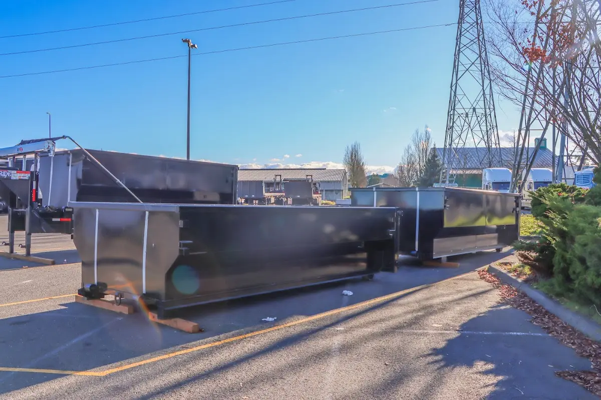 Roll-off dumpster ready for waste disposal at job site for 3 Yard Dumpster Rental in Auburn